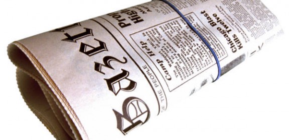 rolled up newspaper