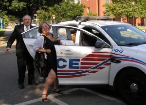 Howard University police pick up NSNC members Bob Haught and Joani Foster ... to give them a ride back to the student union, June 28, 2014.
